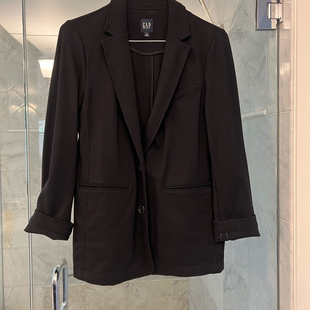 GAP Black Blazer. Relaxed fit, has some stretch to it.